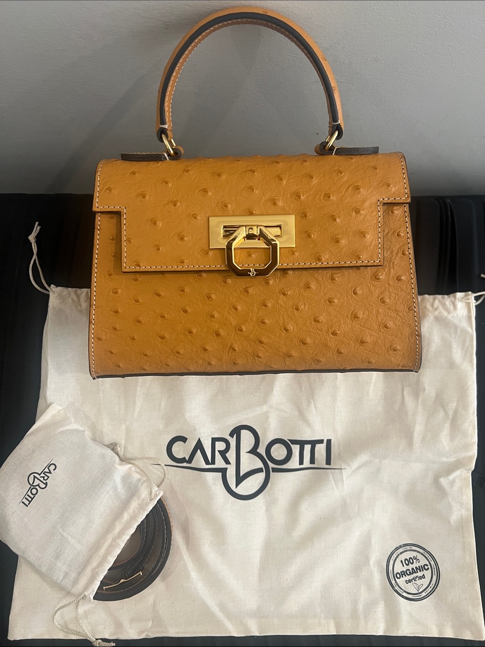 New Italian brand, Carbotti, Honey Ostrich embossed Top Handle Bag with strap